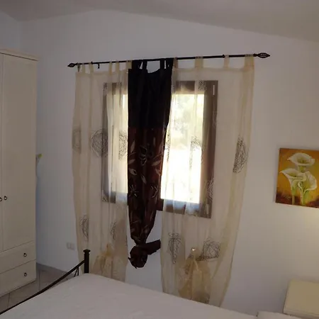 1casadelfaro Con Giardino A Pittulongu 600metri Dalla 度假居 奧爾比亞